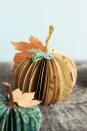 <p>Want a centerpiece that lasts longer than real pumpkins do? Make these elegant paper <a rel="nofollow noopener" href="https://www.womansday.com/home/decorating/g1902/painted-pumpkins-ideas/" target="_blank" data-ylk="slk:pumpkin;elm:context_link;itc:0;sec:content-canvas" class="link ">pumpkin</a> centerpieces instead.</p><p><strong>Get the tutorial at <a rel="nofollow noopener" href="http://www.minted.com/julep/2013/11/19/accordion-paper-pumpkins/" target="_blank" data-ylk="slk:Minted;elm:context_link;itc:0;sec:content-canvas" class="link ">Minted</a>.</strong></p>