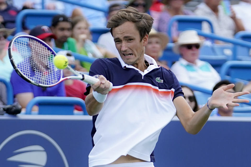 Daniil Medvedev, of Russia, returns to David Goffin, of Belgium, in the men's final match during the Western & Southern Open tennis tournament Sunday, Aug. 18, 2019, in Mason, Ohio. (AP Photo/John Minchillo)