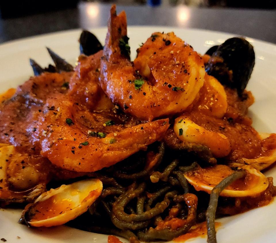 Frutti di Mare with squid ink pasta is a specialty at Ports of Italy in Boothbay Harbor.