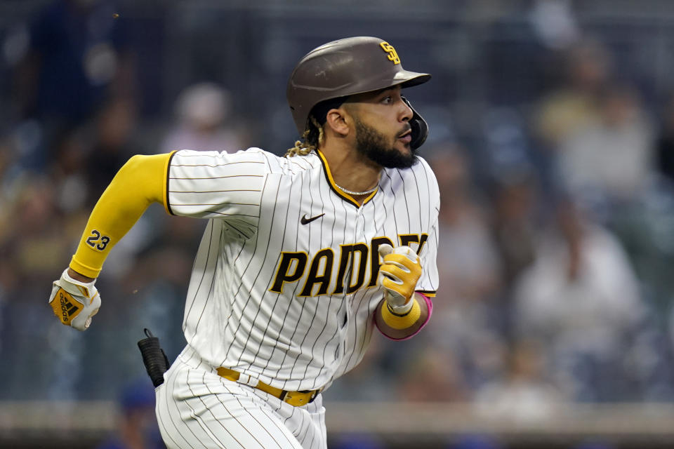 San Diego Padres' Fernando Tatis Jr. runs to first as he lines out during the second inning of the team's baseball game against the Chicago Cubs, Tuesday, June 8, 2021, in San Diego. (AP Photo/Gregory Bull)