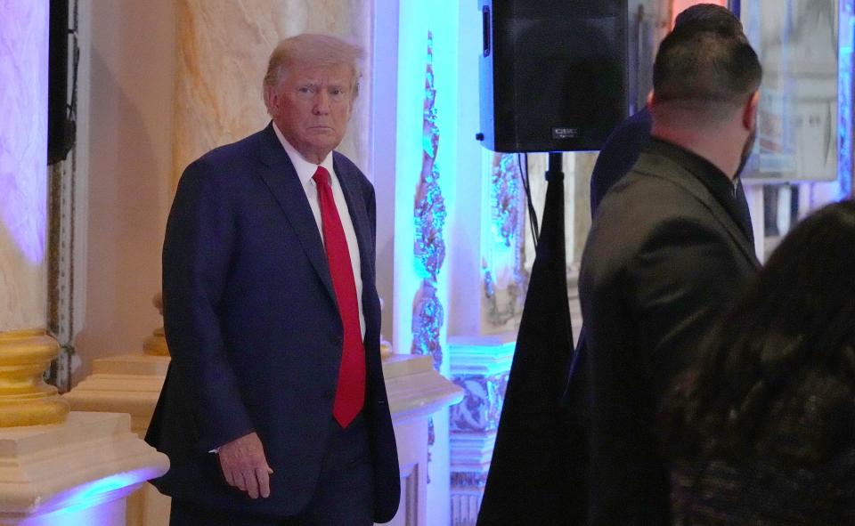 Former president Donald Trump walks over to address the media in the ballroom during an election watch party at Mar-a-Lago in Palm Beach on Tuesday, Nov. 8, 2022.