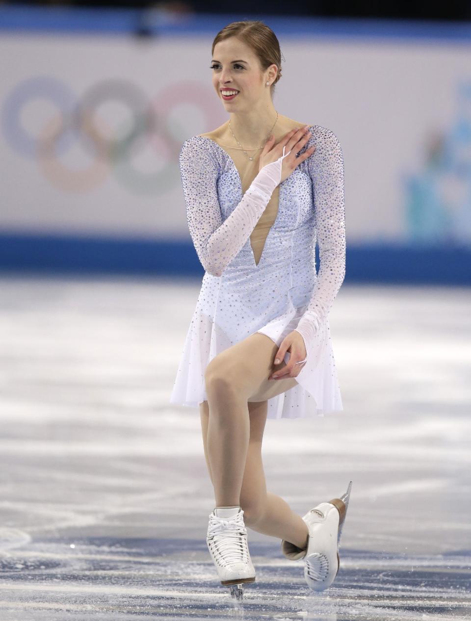 Carolina Kostner of Italy competes in the women's short program figure skating competition at the Iceberg Skating Palace during the 2014 Winter Olympics, Wednesday, Feb. 19, 2014, in Sochi, Russia. (AP Photo/Bernat Armangue)