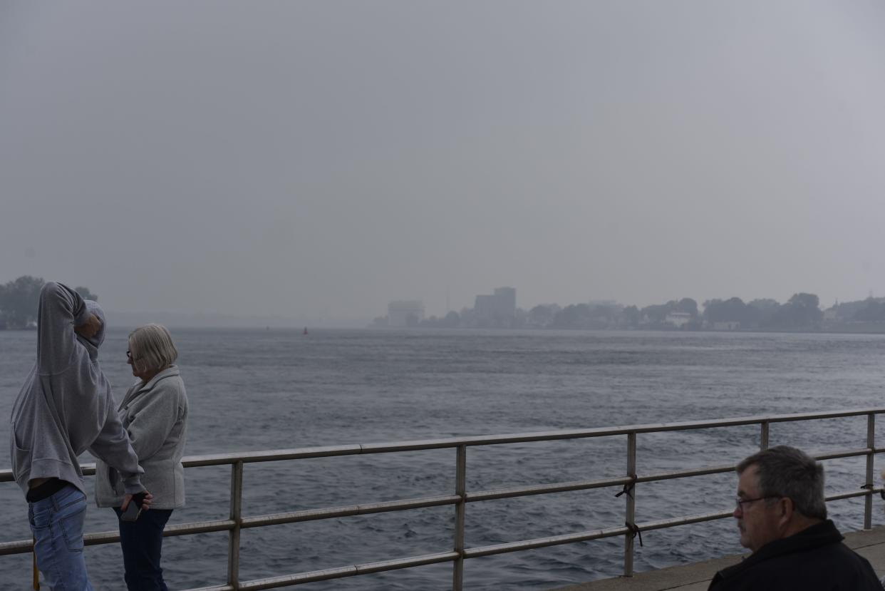 Fog stretching over the coastline on June 27, 2023. People had gathered to watch a flyover by the Air National Guard, but the fog prevented people from seeing it.