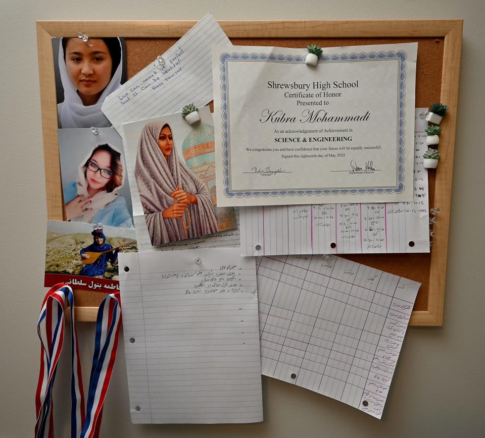 Afghan refugee Kubra Mohammadi, a junior at Shrewsbury High School, keeps photos in her bedroom of her friends that were slain by the Taliban.