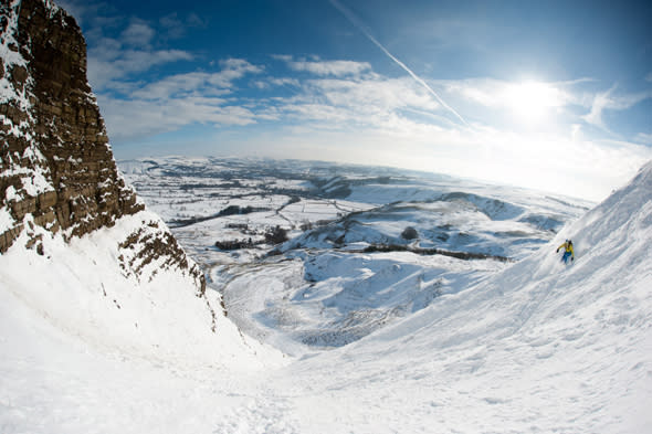 Mandatory Credit: Photo by Alex Messenger/Solent News/REX (4418730e) Skier on Mam Tor Skiers on a snow covered Mam Tor in the Peak District, Derbyshire, Britain - 04 Feb 2015 *Full story: http://www.rexfeatures.com/nanolink/pwnm  These experienced skiers look like they are carving down a mountain in the French Alps - when in fact they are just 20 miles from Sheffield. The adventurous trio travelled to Mam Tor, a 1,695ft hill in the heart of the Peak District, after the country was covered in snow yesterday. When they arrived they were delighted to find the steep hill completely white and coated in fresh powdered snow. The rare moment, which happens 'once every 20 years' because of the wind direction, was caught on camera in the -5 degree Celsius conditions. Photographer Alex Messenger, from Manchester, captured the unique moment when he travelled to the picturesque spot with two ski-ing friends. He described the hill as being like a 'little corner of the Alps', when in reality they were just 30 miles from their home in Manchester. 