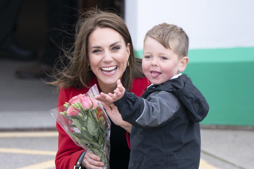 Kate receives a posy of flowers from four-year-old Theo Crompton (Danny Lawson/PA) (PA Wire)