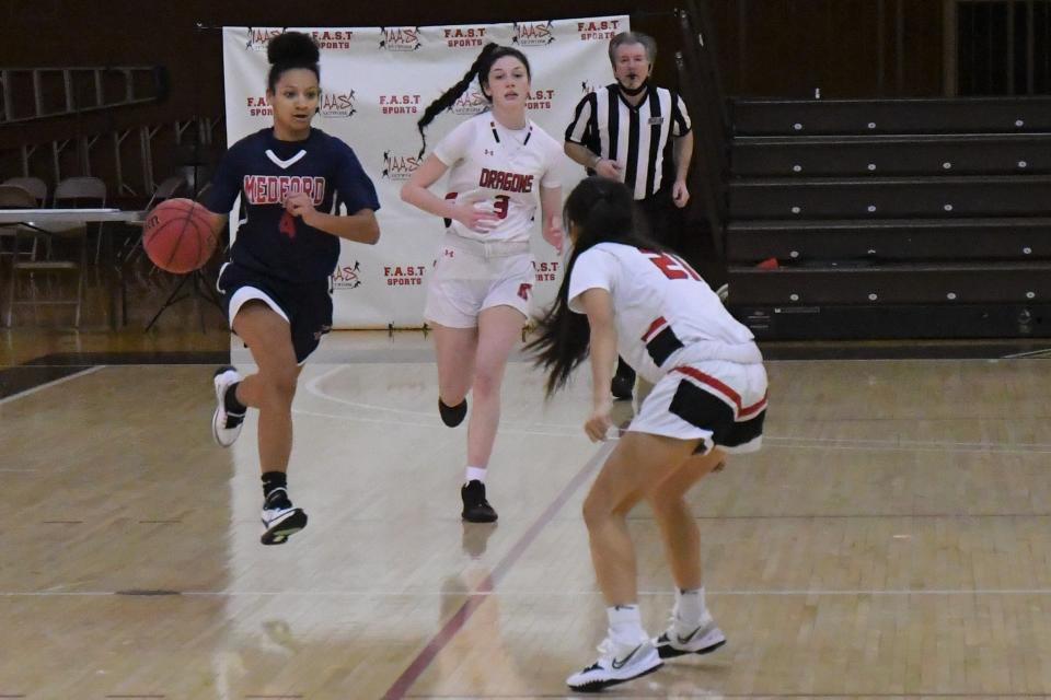 Medford Tech junior Jada Jacobs brings the ball across midcourt against Kingsway