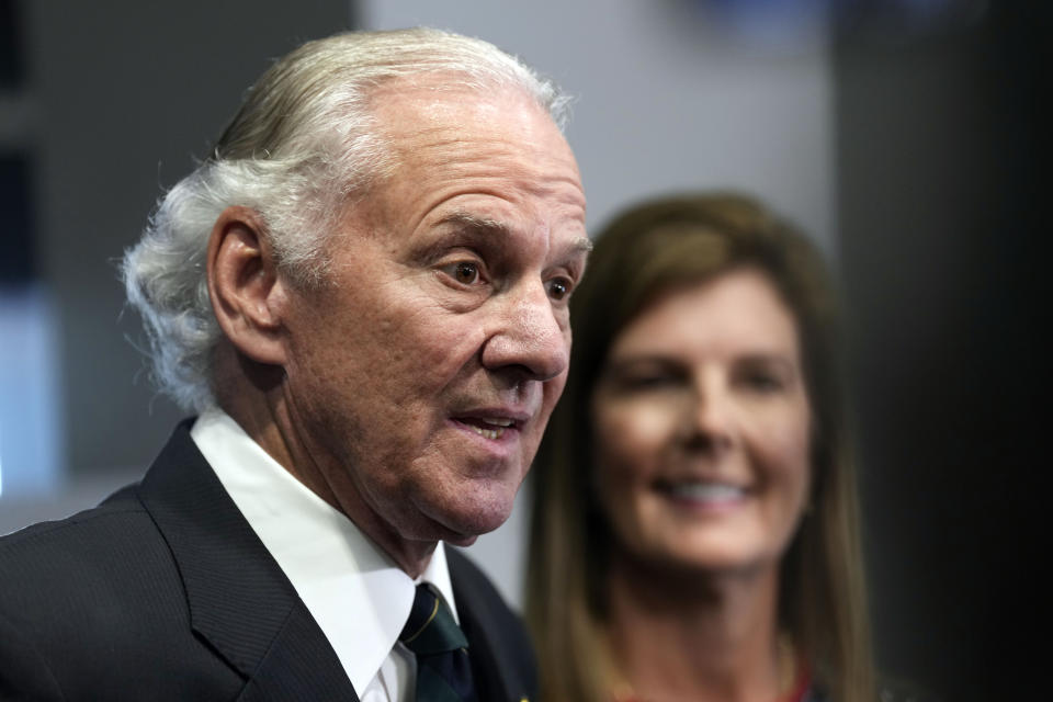 Lt. Gov. Pamela Evette, right, looks on as Gov. Henry McMaster, left speaks with reporters after Evette signed her paperwork to run again on a ticket with the governor on Wednesday, July 27, 2022, in Columbia, S.C. McMaster and Evette are the first candidates to file for reelection on a ticket in South Carolina, which previously elected its two top officeholders separately. (AP Photo/Meg Kinnard)