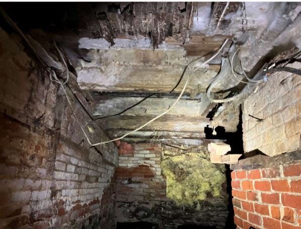 McLaggan's report said mildew was observed covering over half of the floor support beams in the basement.