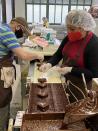 FILE PHOTO: Workers process sweets at Li-Lac Chocolates in the Brooklyn borough of New York City