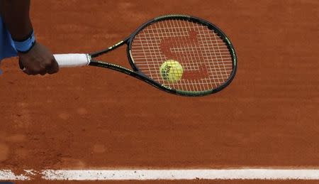 Tennis - French Open - Roland Garros - Serena Williams of the U.S. vs Teliana Pereira of Brazil - Paris, France - 26/05/16. The racket of Williams. REUTERS/Gonzalo Fuentes