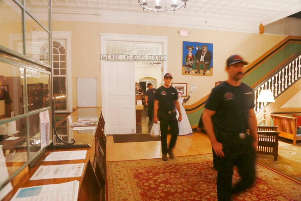 Wildland firefighters from various cities in California leave the The Castañeda Hotel after eating a hot meal in Las Vegas, N.M., on Saturday, May 7, 2022. The hotel is offering meals for displaced residents and firefighters. For many, it's the first meal they've hot meal had in days, or the first with silverware and a table.