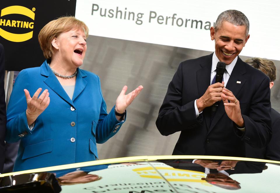 Obama and Merkel share a laugh as they tour the Hanover Industrial Fair in Hanover, central Germany, on April 25.