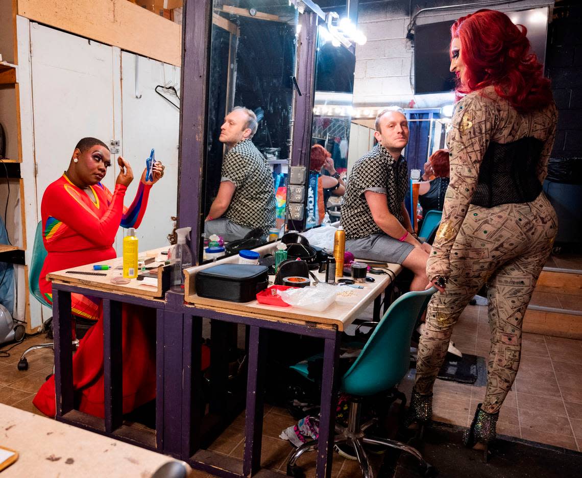 Erica Chanel touches up her makeup in the dressing room of Legends Club in Raleigh between performances on Saturday, June 8, 2024. Chanel is based in Charlotte, N.C. but as a full time drag queen will travel for different gigs such as performances at Legends.