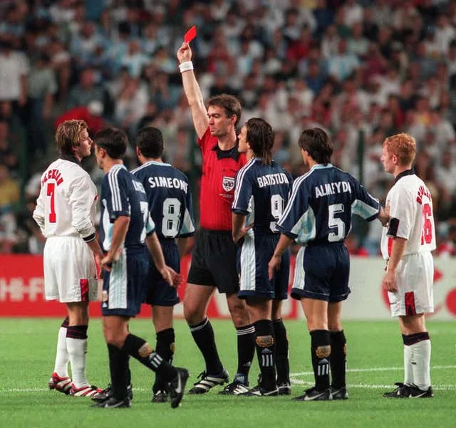 David Beckham is given the red card by referee Kim Milton Nielsen during the World Cup semi-final in 1998