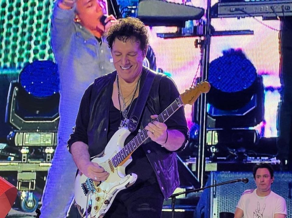 Journey guitarist Neal Schon performs during the Concert for Legends in August at Tom Benson Hall of Fame Stadium during the Pro Football Hall of Fame Enshrinement Festival.