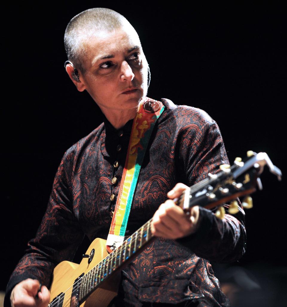 rish singer Sinead O'Connor performs on August 11, 2013 in Lorient, western of France during the Inter-Celtic Festival of Lorient.
