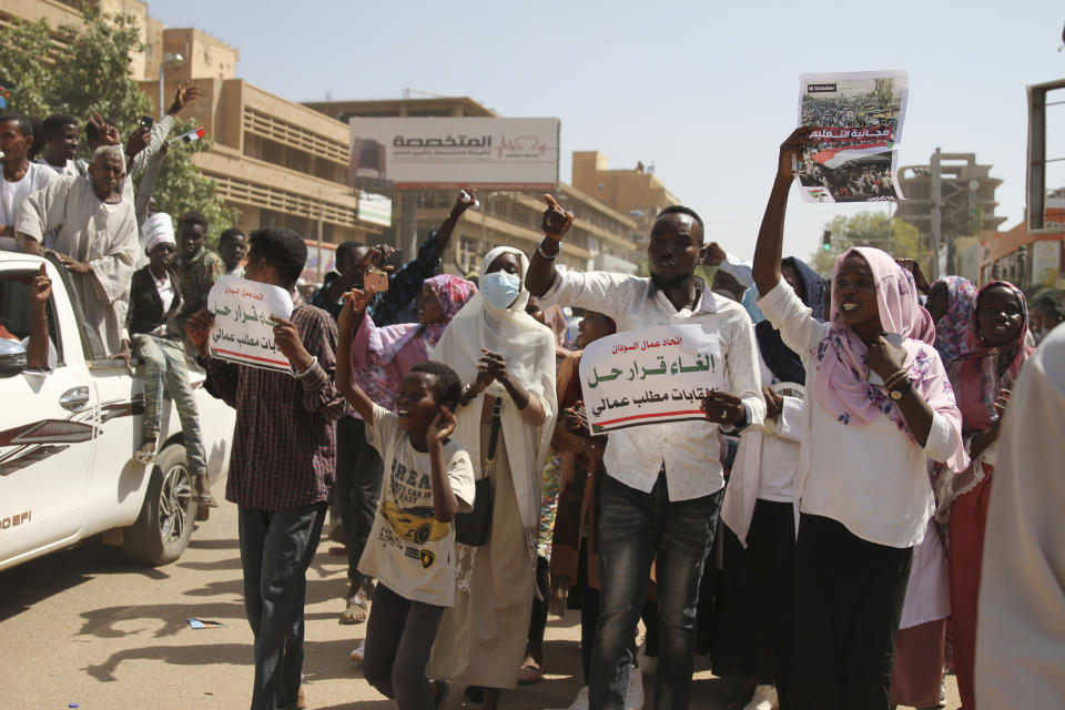 Sudanese protesters take part in a rally demanding the dissolution of the transitional government, outside the presidential palace in Khartoum, Sudan, Saturday, Oct. 16, 2021. (AP Photo/Marwan Ali)