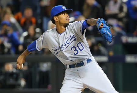 Oct 30, 2015; New York City, NY, USA; Kansas City Royals starting pitcher Yordano Ventura throws a pitch against the New York Mets in the first inning in game three of the World Series at Citi Field. Mandatory Credit: Anthony Gruppuso-USA TODAY Sports