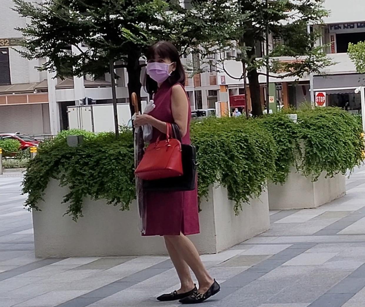 Tan Beow Hiong exited the State Courts after her court hearing on 2 July. (PHOTO: Yahoo News Singapore/Wan Ting Koh)