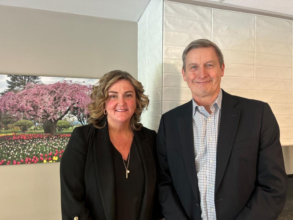 Accessible Housing Calgary's executive director Krista Davidson Flint and board chair Dave McElhanney.