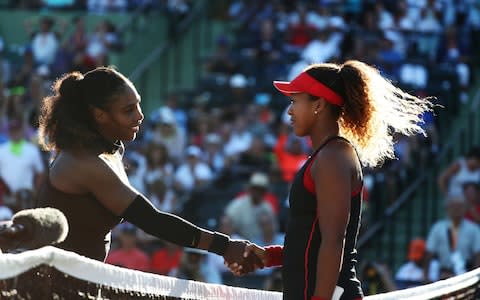 Serena Williams meets Naomi Osaka of Japan after losing to her in straight sets during Day 3 of the Miami Open at the Crandon Park Tennis Center on March 19, 2018 in Key Biscayne, Florida - Credit: Getty Images 