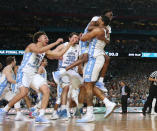 <p>North Carolina Tar Heels forward Kennedy Meeks (3) celebrates with teammates after defeating the Gonzaga Bulldogs 71-65 in the championship game of the 2017 NCAA Men’s Final Four at University of Phoenix Stadium. Mandatory Credit: Bob Donnan-USA TODAY Sports </p>