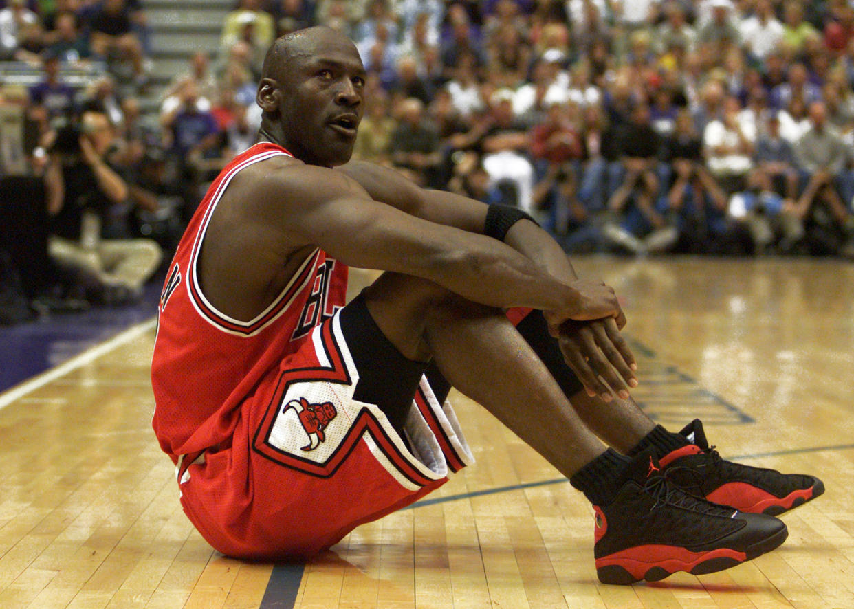 Chicago Bulls guard Michael Jordan sits on the court between points as the defending NBA champion Bulls trail Utah Jazz, during the second quarter of game one of the NBA Finals in Salt lake City, June 3.

BPS/VM/SB