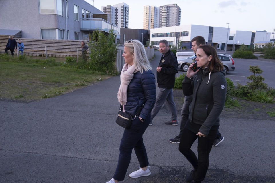 This photo taken Friday 15, June, 2019 shows Linda Hilmarsdottir, Josep Gunnarsson, Marta Sigurjonsdottir, Heidar Atlason, who are part of the "Parent Patrol" in the Korar neighborhood of Reykjavik. Parent patrols to check out the usual youth hangouts form part of the Icelandic strategy to turn around a crisis in teenage drinking and smoking, and it has been so successful that Iceland has one of the lowest rates of youth substance abuse in Europe.(AP Photo/Egill Bjarnason)