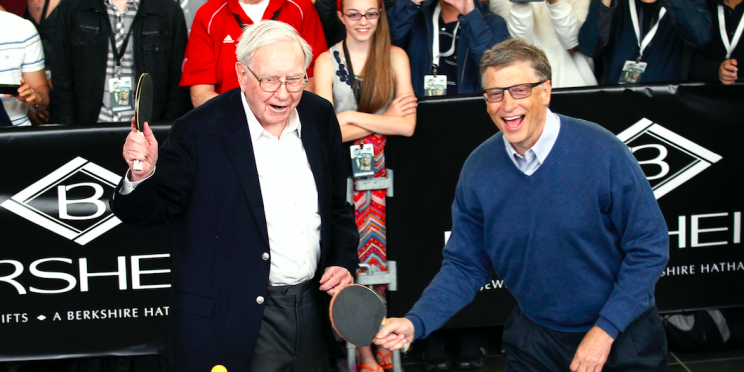 Berkshire Hathaway CEO Warren Buffett (L) and friend Bill Gates, founder of Microsoft, play table tennis at a Berkshire sponsored reception in Omaha, Nebraska May 4, 2014 as part of the company annual meeting weekend. The investment guru was peppered with questions at the meeting, part of a mostly festive weekend that Buffett calls 