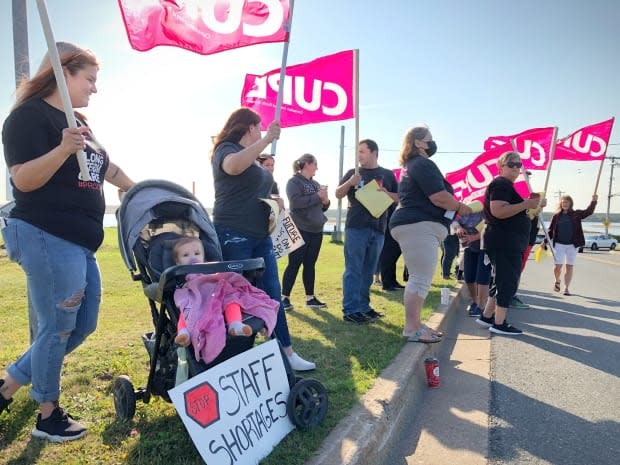More than 25 workers at the Seaview Manor nursing home in Glace Bay mounted an information picket on Wednesday to raise awareness of a labour shortage in long-term care. (Tom Ayers/CBC - image credit)