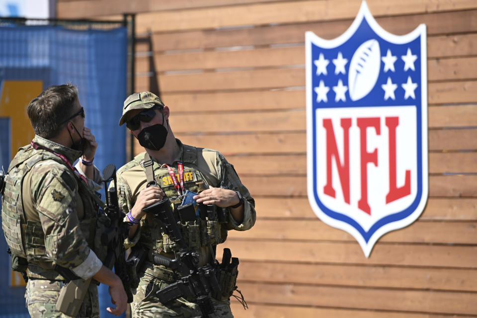 Law enforcement officers stand guard in front of the entrance to the stadium prior to Super Bowl LV at Raymond James Stadium on February 07, 2021 in Tampa, Florida. The Tampa Bay Buccaneers will take on the defending champion Kansas City Chiefs. (Photo by Douglas P. DeFelice/Getty Images)