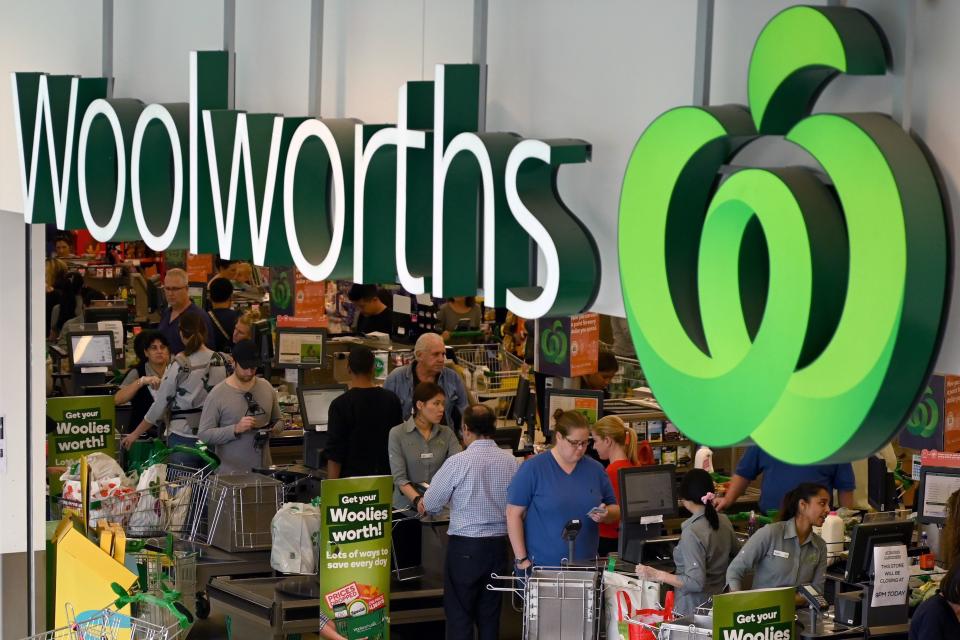 People shop at a Woolworths supermarket in Sydney on March 17, 2020. - Australia's elderly were let in early to supermarkets on March 17, but coronavirus panic buying still proved too much in some areas, with reports of empty shelves and large queues. (Photo by PETER PARKS / AFP) (Photo by PETER PARKS/AFP via Getty Images)