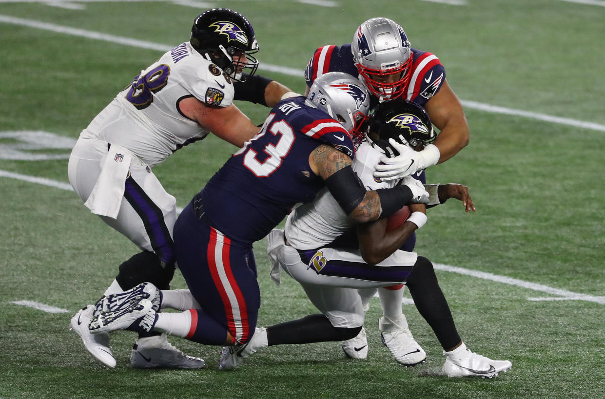 Lamar Jackson had a quiet night as the Ravens fell to the Patriots. (Photo by Maddie Meyer/Getty Images)