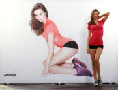 Model and Reebok Easytone Ambassador Miranda Kerr reveals a 3D image shot by Rankin during a Reebok Satisfaction photo call on the roof of the Bayerisch Hof Hotel on April 17, 2012 in Munich, Germany.