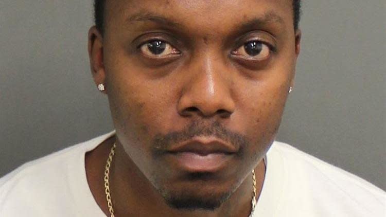 Jamal Daniel Todman, 34, has been charged with criminal negligence after his 5-year-old son fatally shot himself with a gun his father allegedly kept in the glove box of his car. (Photo: Orange County Jail)