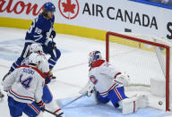 Toronto Maple Leafs forward William Nylander (88) scores past Montreal Canadiens goaltender Jake Allen (34) during the second period of an NHL hockey game Saturday, May 8, 2021, in Toronto. (Nathan Denette/The Canadian Press via AP)