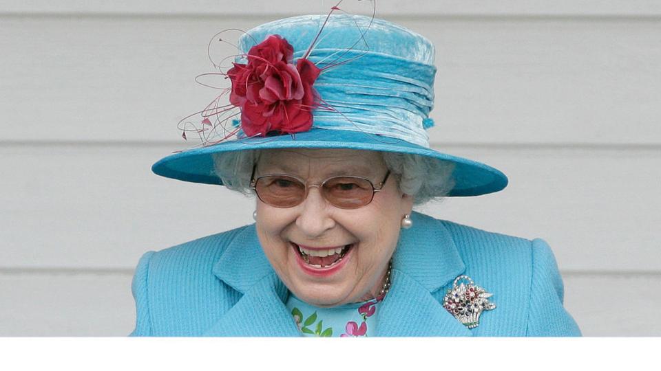 HM Queen Elizabeth II watches the final of the Harcourt Developments Queen's Cup polo tournament from the balcony of the Royal Box at Guards Polo Club on June 13, 2010 in Egham, England