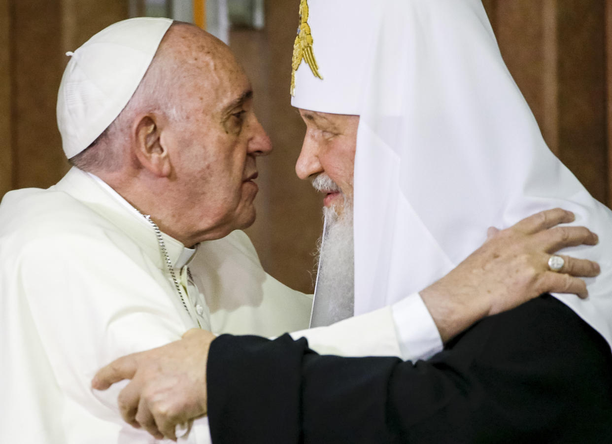 FILE — In this Friday, Feb. 12, 2016 file photo, Pope Francis, left, reaches to embrace Russian Orthodox Patriarch Kirill after signing a joint declaration at the Jose Marti International airport in Havana, Cuba. Pope Francis hasn’t made much of a diplomatic mark in Russia’s war in Ukraine as his appeals for an Orthodox Easter truce went unheeded and a planned meeting with the head of the Russian Orthodox Church was canceled. (AP Photo/Gregorio Borgia, Pool)