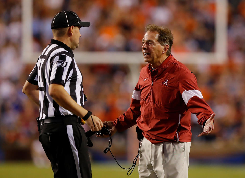 AUBURN, ALABAMA - NOVEMBER 30:  Head coach Nick Saban of the Alabama Crimson Tide reacts to head linesman Thomas Eaton during the game against the Auburn Tigers at Jordan Hare Stadium on November 30, 2019 in Auburn, Alabama. (Photo by Kevin C. Cox/Getty Images)