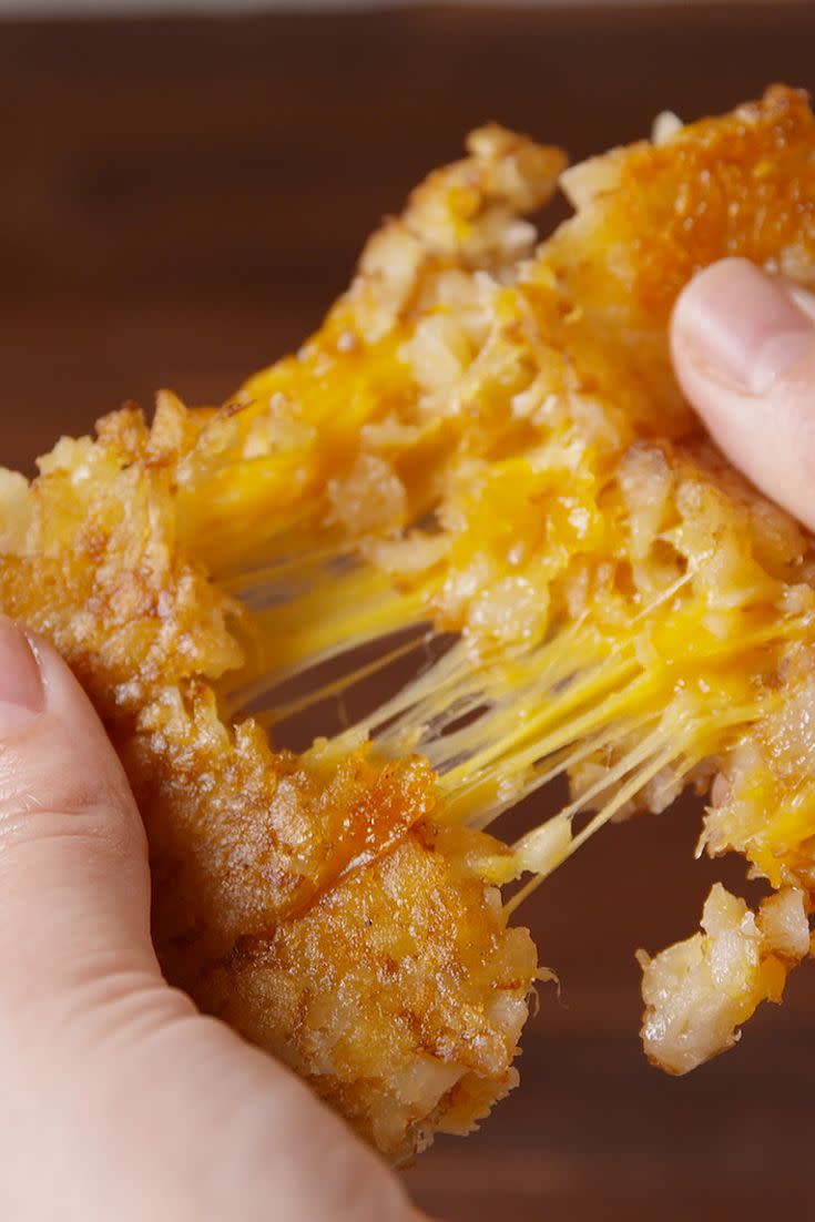 <p>Just when you thought nothing could get better than bread.</p><p>Get the recipe from <a href="https://www.delish.com/cooking/recipe-ideas/videos/a43885/tater-tot-grilled-cheese-best-grilled-cheese-recipes/" rel="nofollow noopener" target="_blank" data-ylk="slk:Delish;elm:context_link;itc:0;sec:content-canvas" class="link ">Delish</a>.</p>