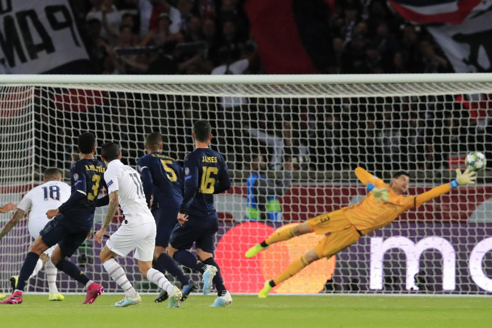 PSG's Angel Di Maria, 3rd left, scores his side's second goal during the Champions League group A soccer match between PSG and Real Madrid at the Parc des Princes stadium in Paris, Wednesday, Sept. 18, 2019. (AP Photo/Michel Euler)