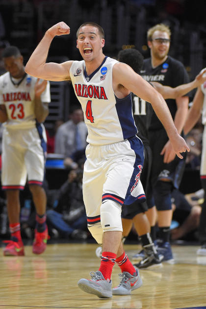 Arizona guard T.J. McConnell reacts after the Wildcats beat Xavier. (AP)