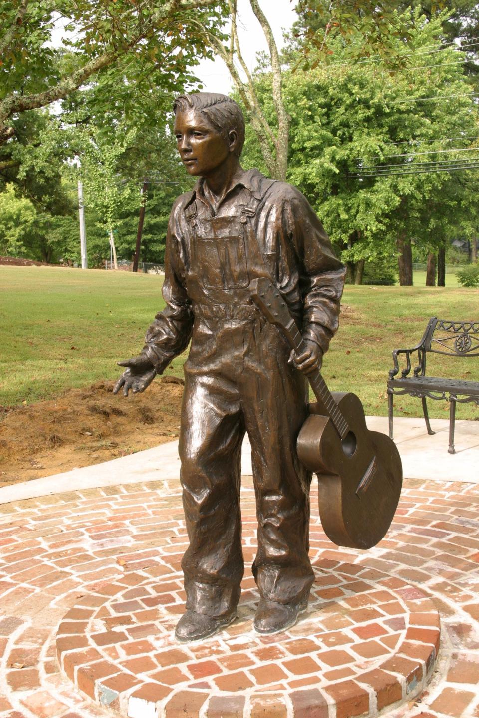 “Elvis at 13” is a life-size statue that is one of the most popular photo spots at Elvis Presley Birthplace Park.