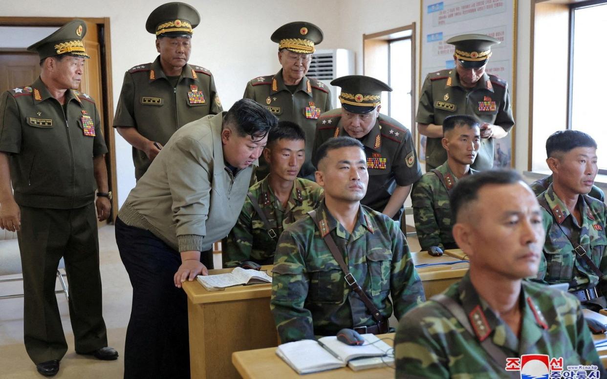 Kim with senior military officials