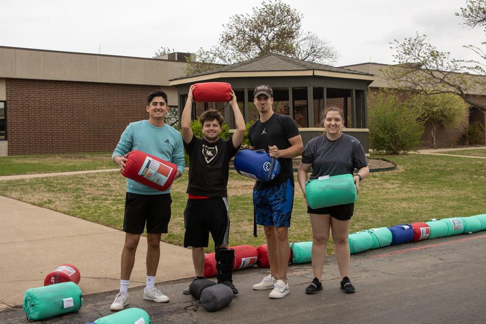 Sleeping bags used by Mid-America Christian University business students to break a Guinness World Record were distributed to local charities and churches to help Oklahomans in need.