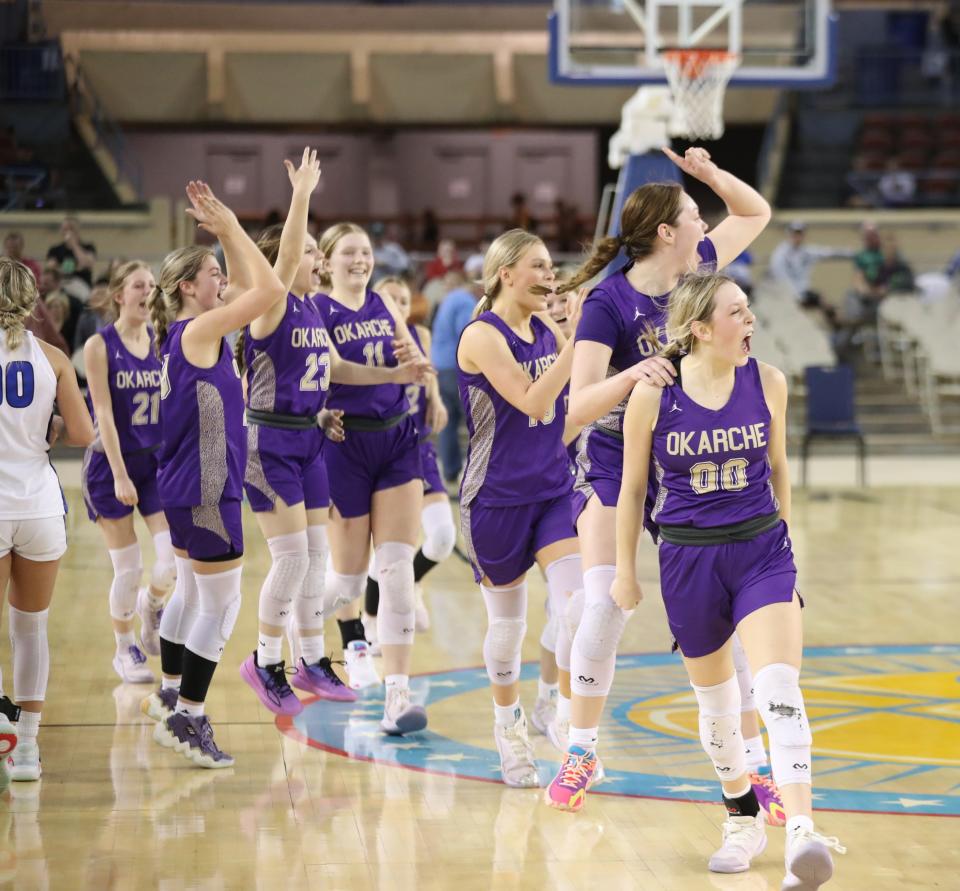 Okarche players leave the court after defeating Cyril during the Class A girls basketball quarterfinals on Wednesday at State Fair Arena.