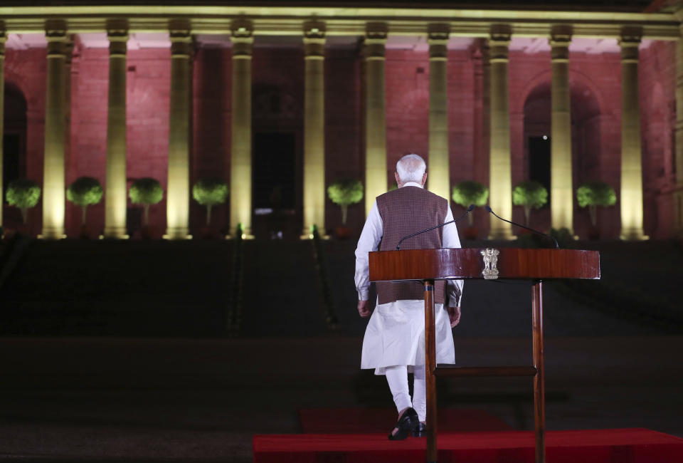 Indian Prime Minister Narendra Modi leaves after addressing the media after meeting with the President to stake claim to form the government in New Delhi, India, Saturday, May 25, 2019. Newly elected lawmakers from India's ruling alliance led by the Hindu nationalist Bharatiya Janata Party elected Narendra Modi as their leader on Saturday, paving the way for his second five-year term as prime minister after a thunderous victory in national elections. (AP Photo/Manish Swarup)