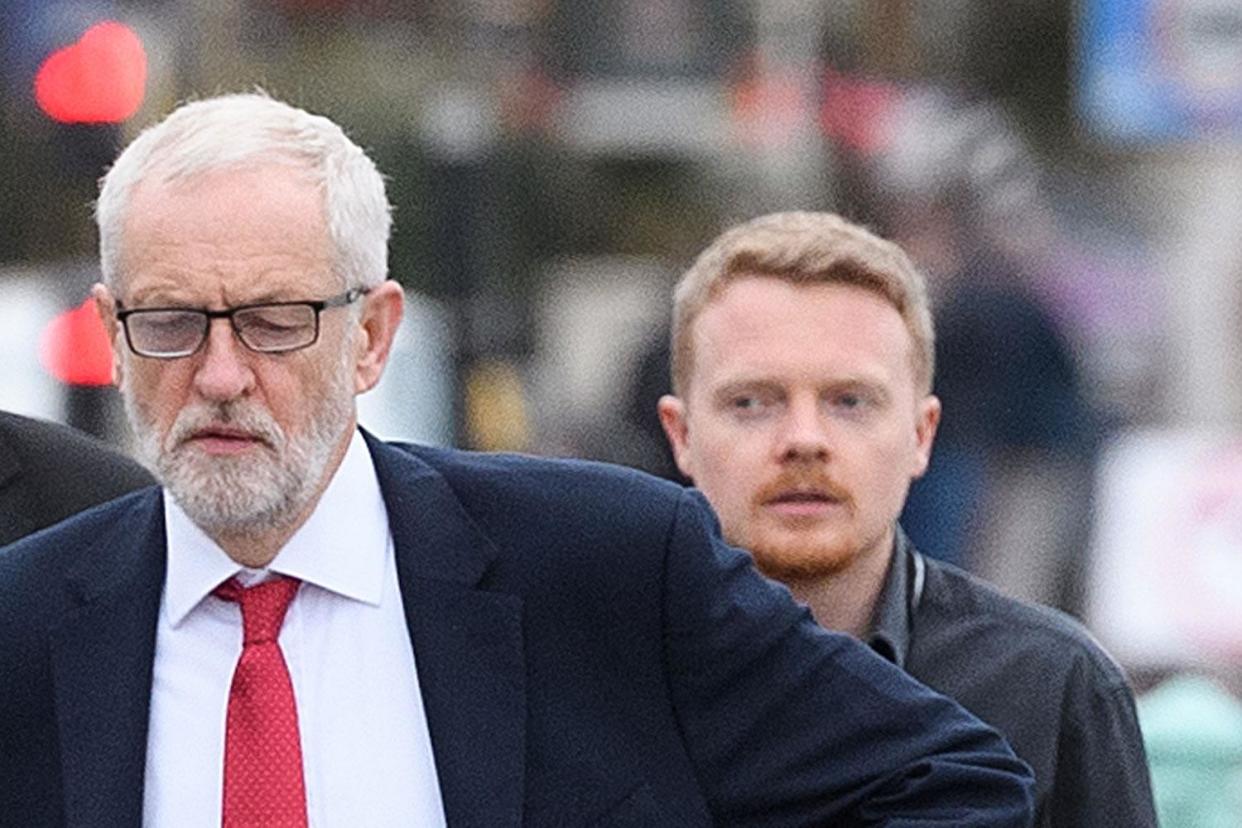 Jeremy Corbyn with Labour activist Andrew Fisher (Photo by Leon Neal/Getty Images)