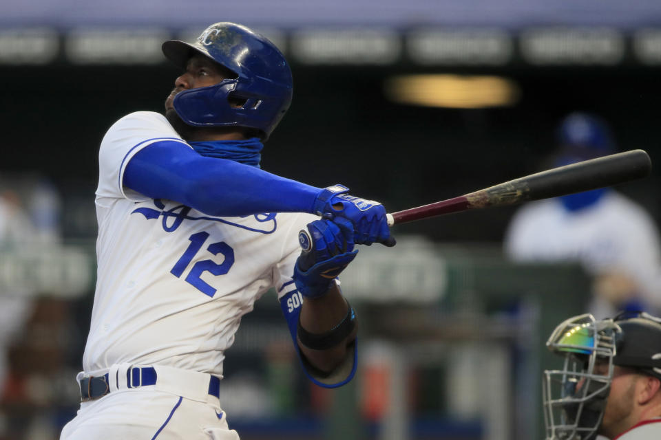 Kansas City Royals' Jorge Soler hits a three-run home run during the fourth inning of a baseball game against the Minnesota Twins at Kauffman Stadium in Kansas City, Mo., Saturday, Aug. 8, 2020. (AP Photo/Orlin Wagner)